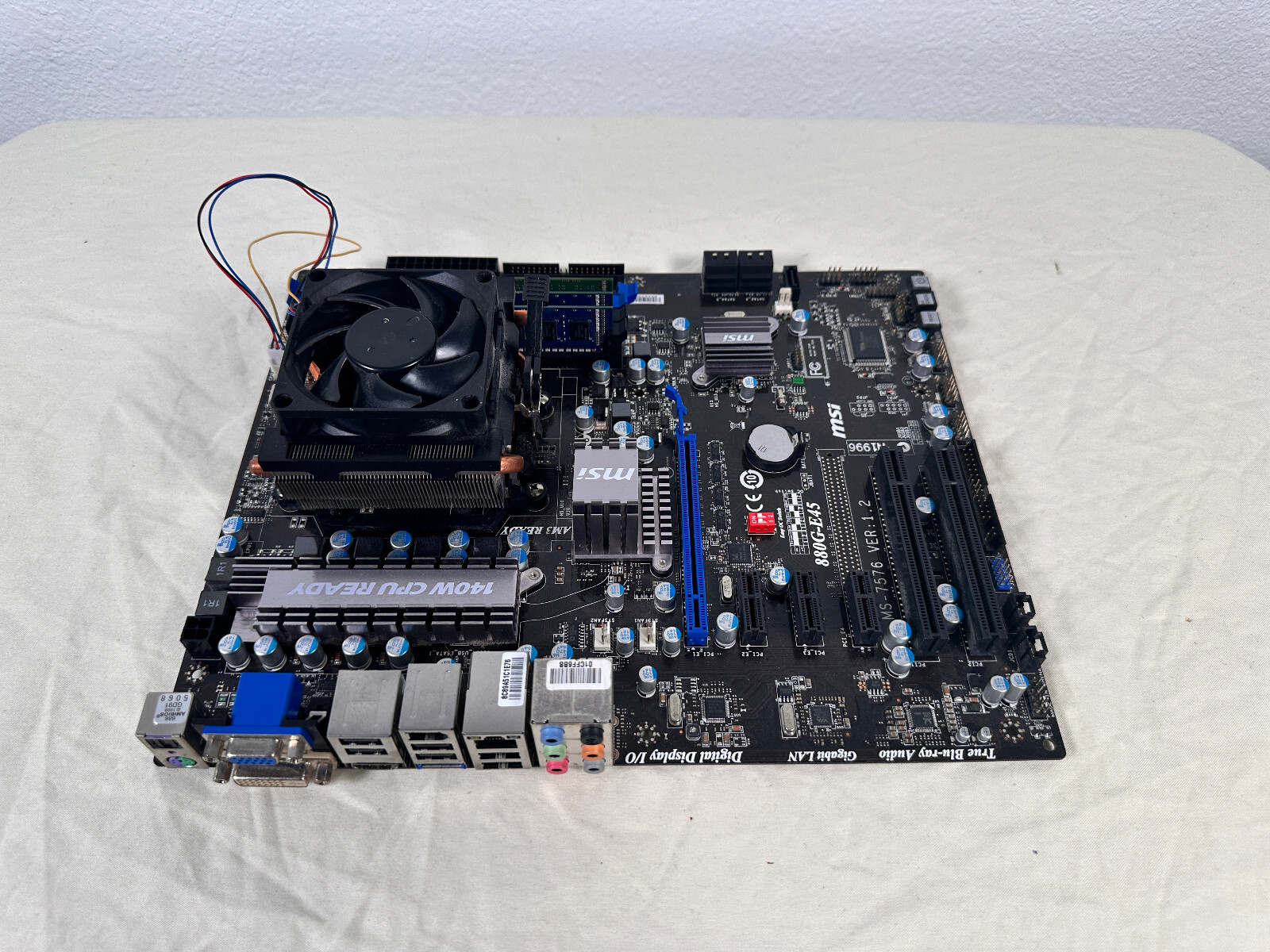 MSI 880G-E45 MOTHERBOARD WITH AMD PHENOM 2 CPU AND HEATSINK