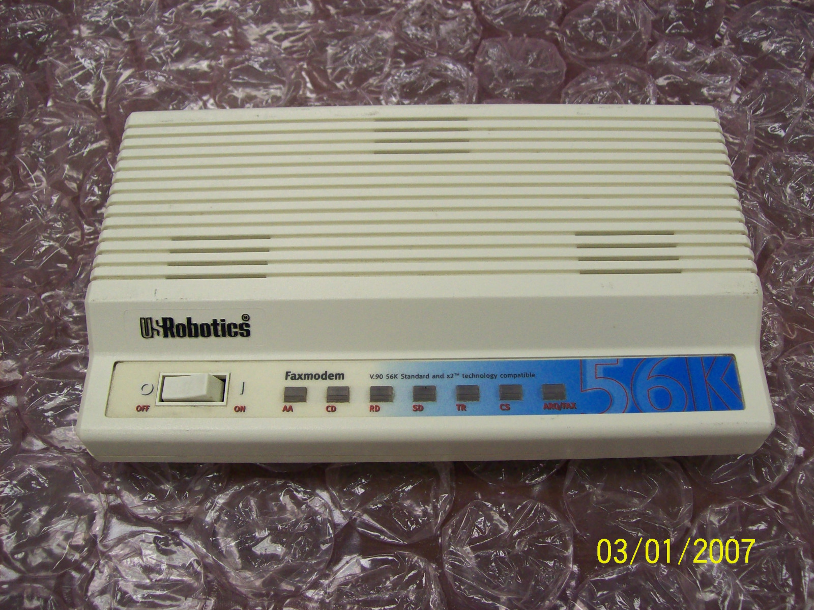 U. S. Robotics V.92 56K (25 pin Serial Cable Connection, powerered up) Faxmodem