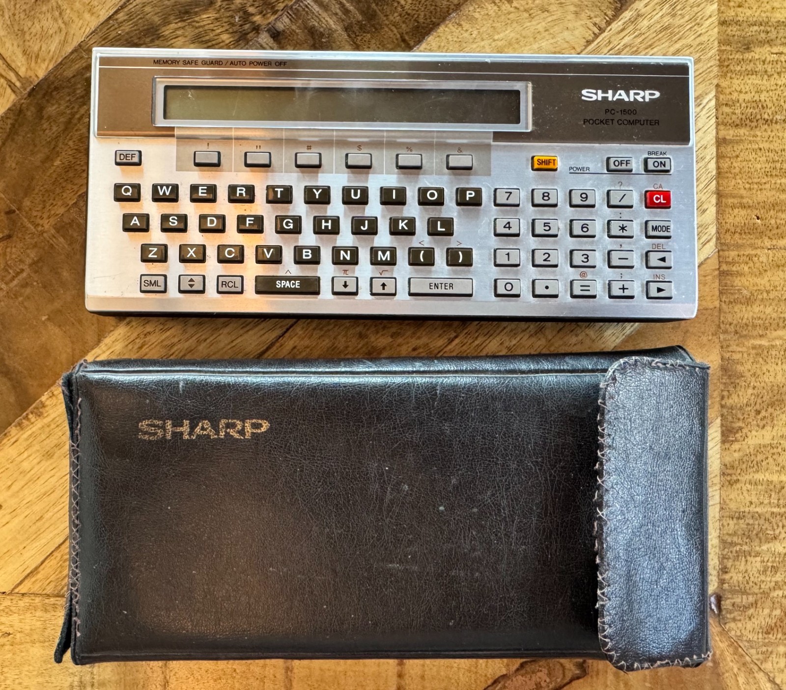 Vintage Sharp PC-1500 Pocket Computer Calculator w/ Leather Case and Memory Card