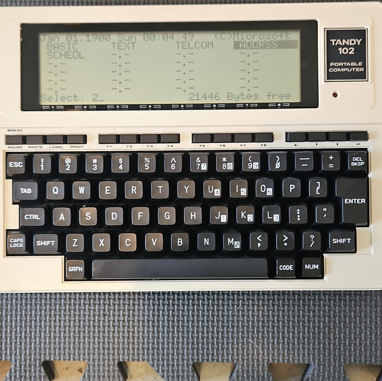 Tandy 102 Portable Computer  - no power cord, but works. 