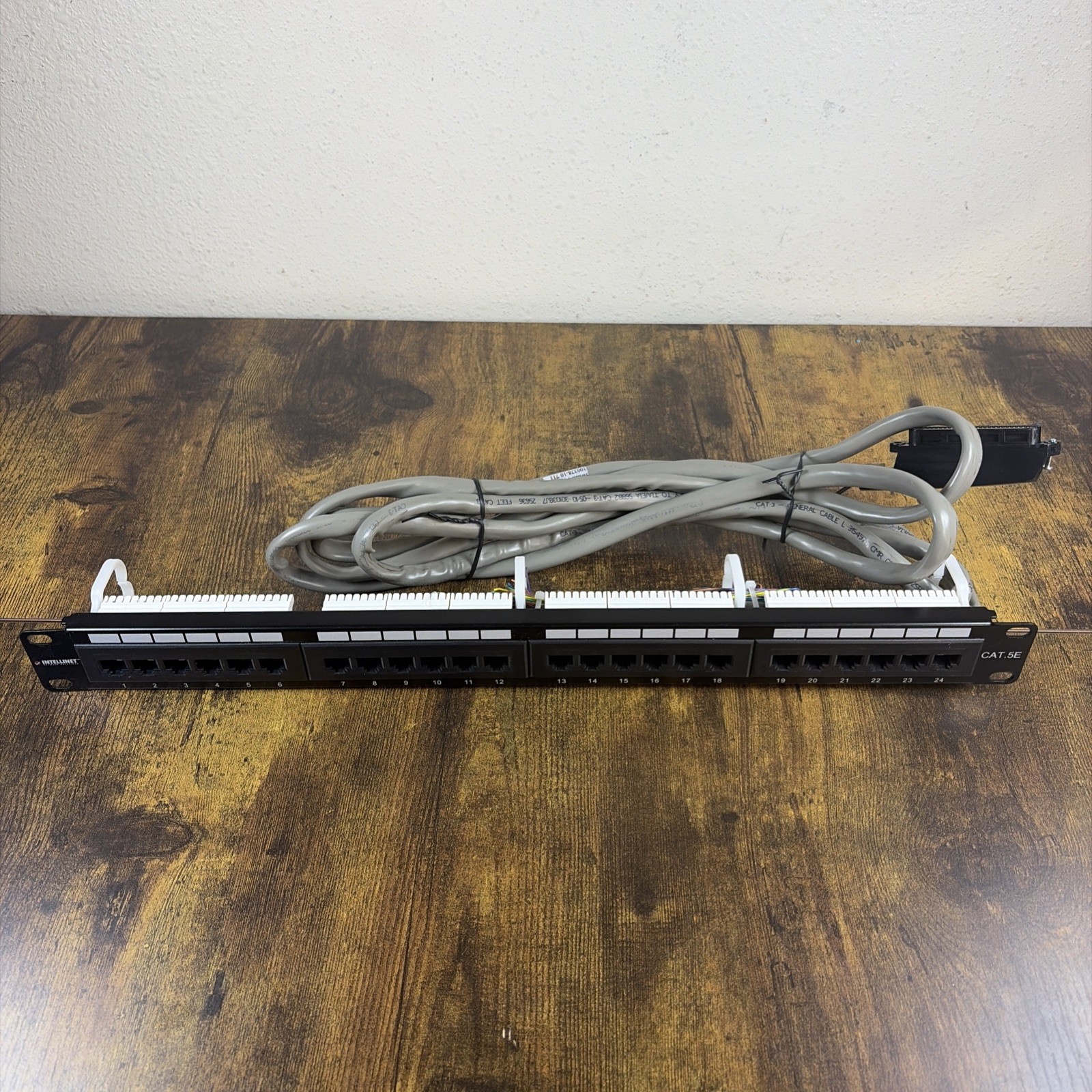 Intellinet Network Solutions 24-Port Cat5e Patch Panel With Switch Cable Used