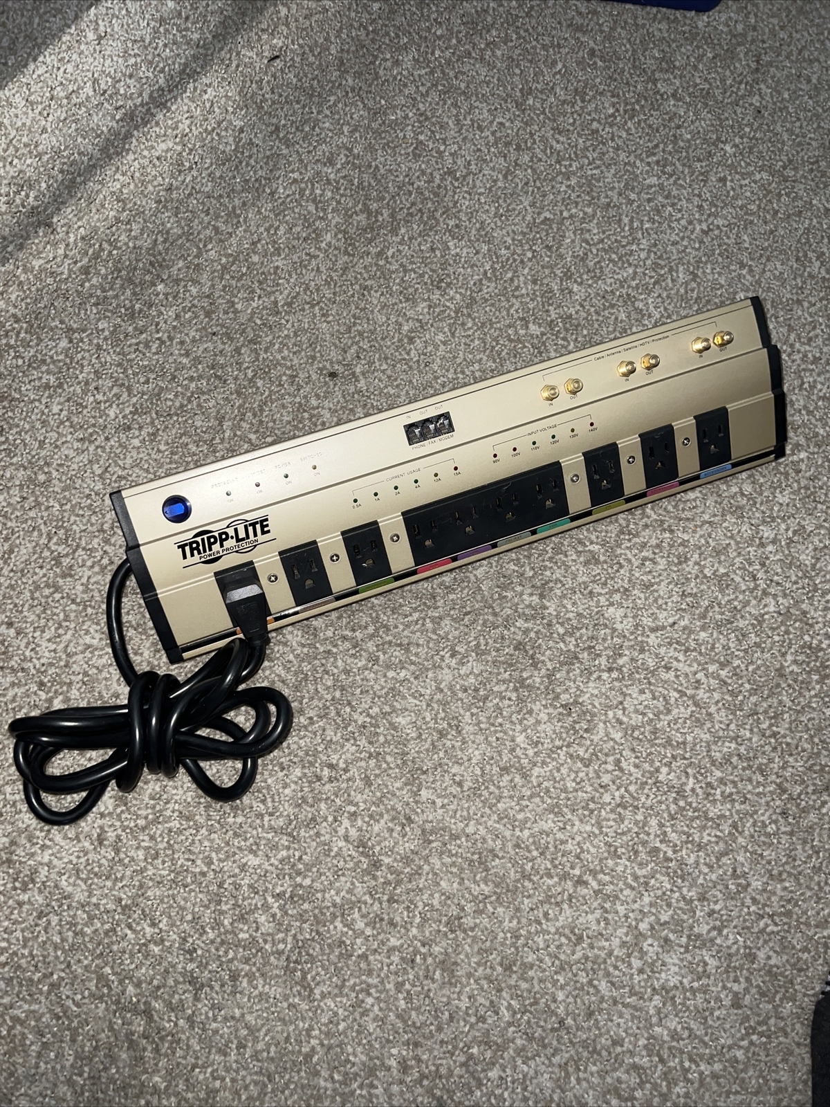 TrippLite HTPowerBar10 Surge Protector 10 Outlets Phone Fax Modem Cable In/Out