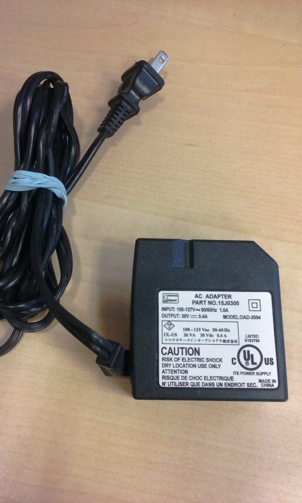 Skynet AC Adapter Part No: 15J0300. Model DAD-3004. 