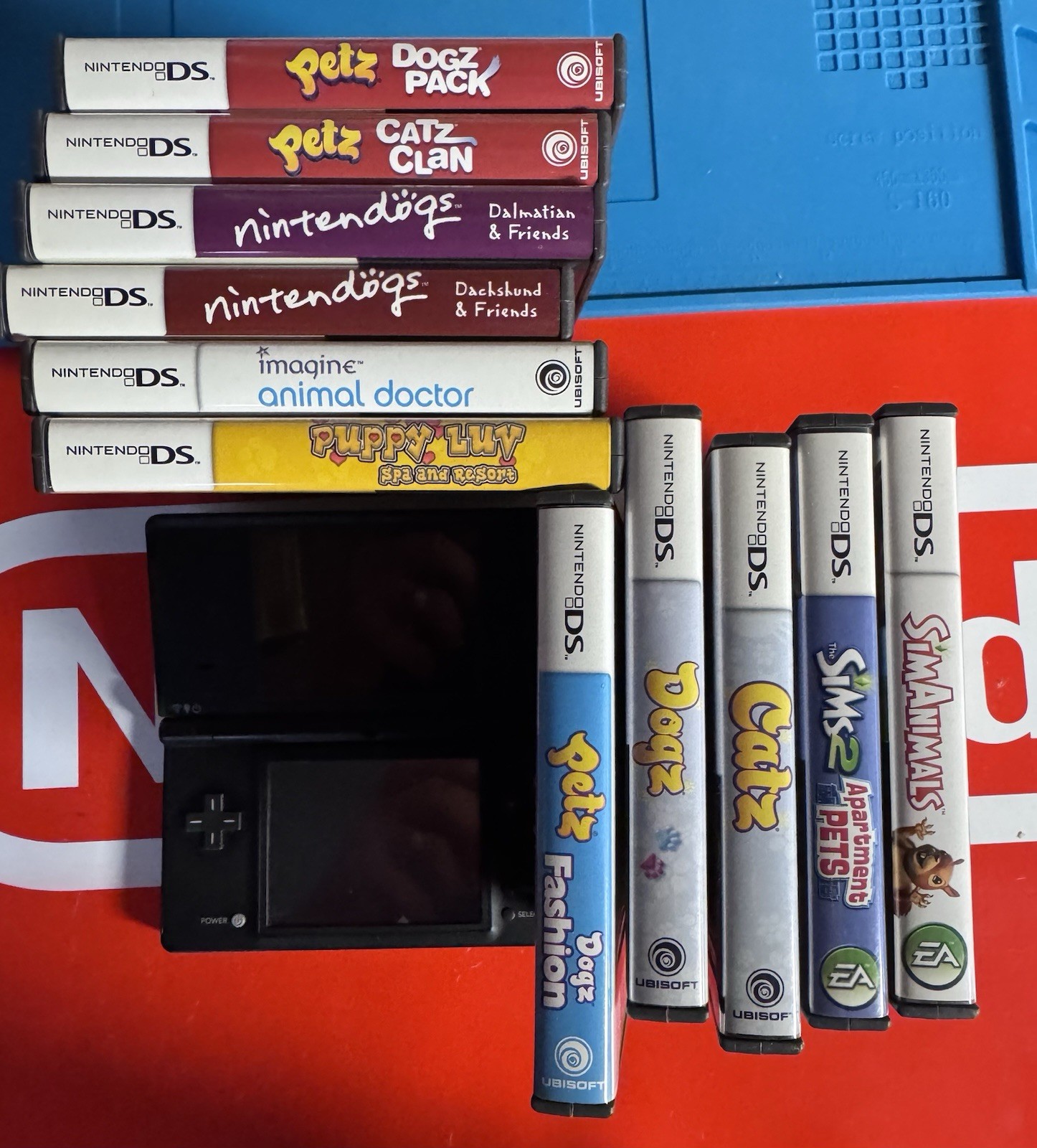 Nintendo DSi Black Console Bundle 10 CIB Games Nintendogs Sims Petz SimAnimals