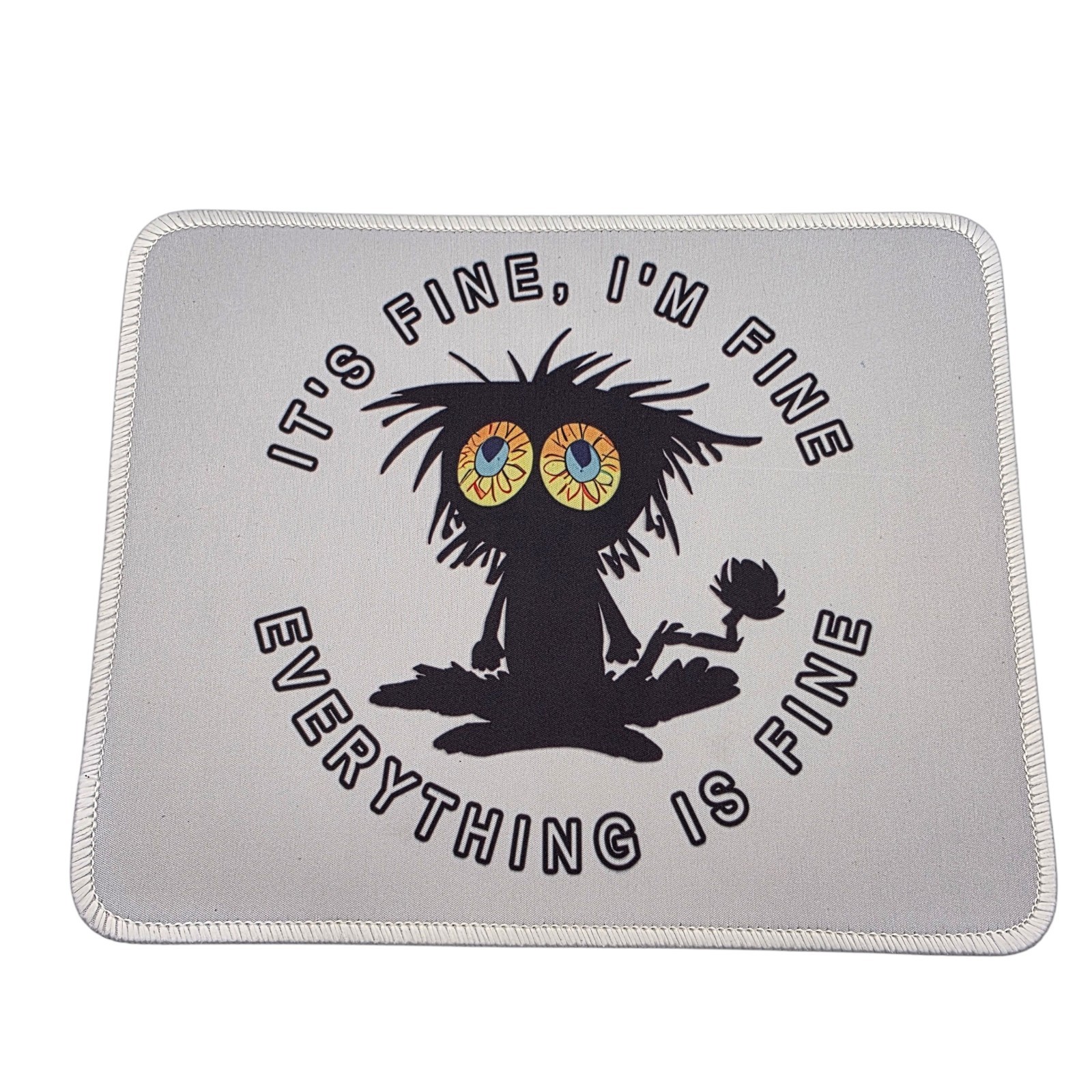 Mouse Pad With Stressed Wide Eyed Black Cat Design