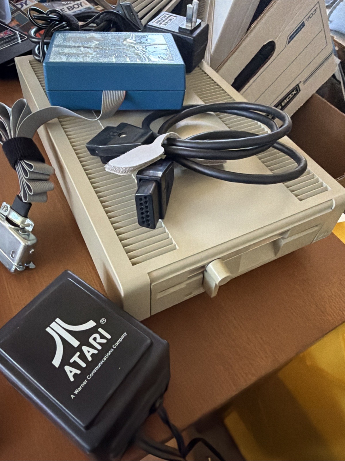 ATARI XF551 DISK DRIVE WITH AC POWER ADAPTER AND PARALLEL PORT ADAPTER, UNTESTED