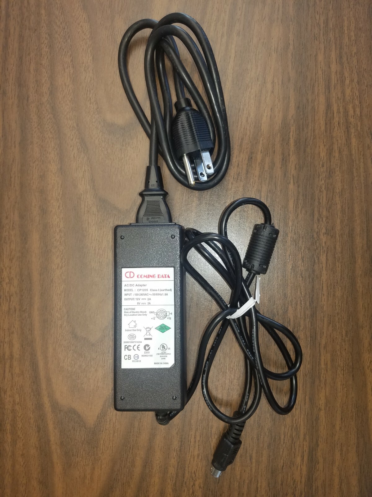 Coming Data OEM CP1205 Adapter; Input: 100-240V; Output: 12V Power Supply