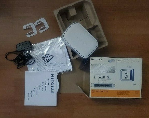 Netgear RP614 100 Mbps 4-Port 10/100 Wired Router, Power adapter, CD, cable, etc