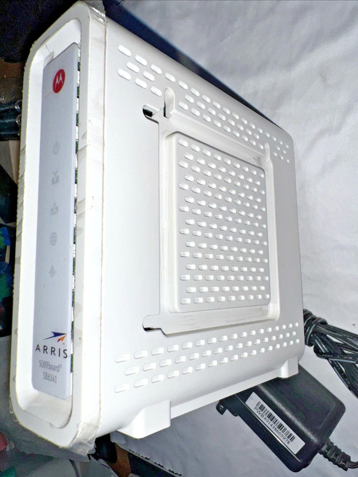 ARRIS SurfBoard Model SB6141 Cable Modem is a high-speed modem w/ Power Cord