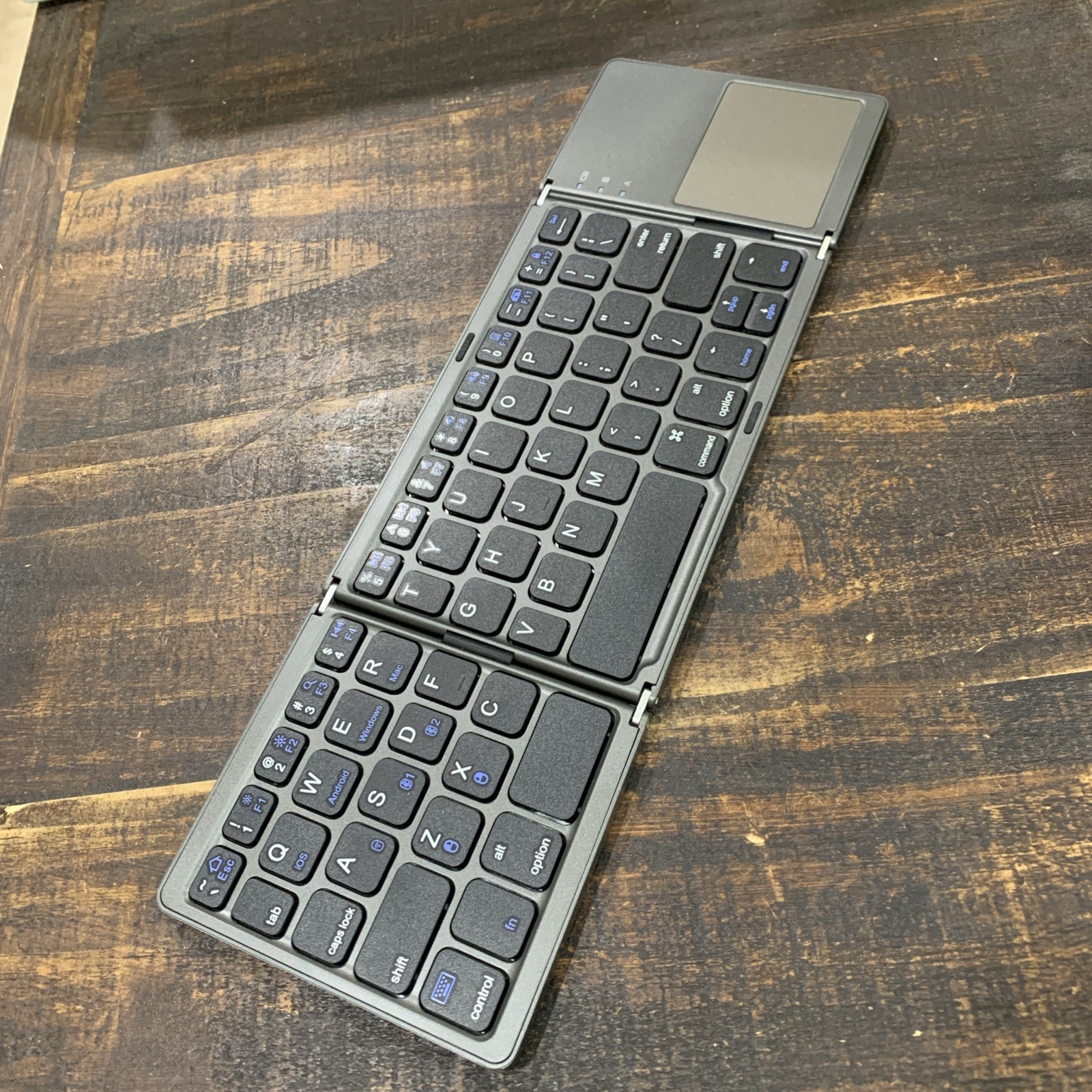 Ultra-thin Tri-fold Bluetooth Keyboard with touchpad Wireless Rechargeable