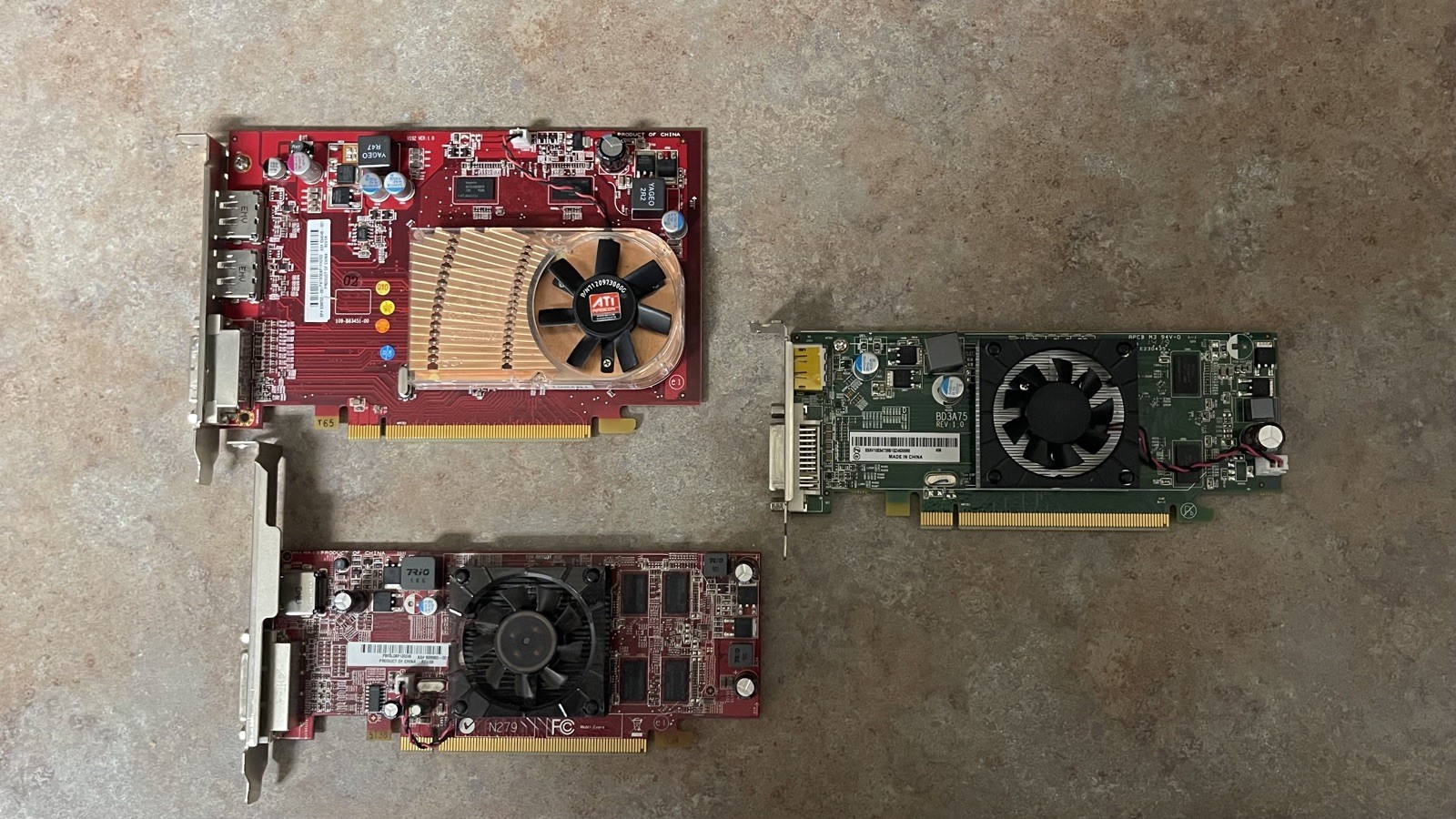 Three (3) video cards PCIe ATI Radeon HD 4650,  5450 and one unknown