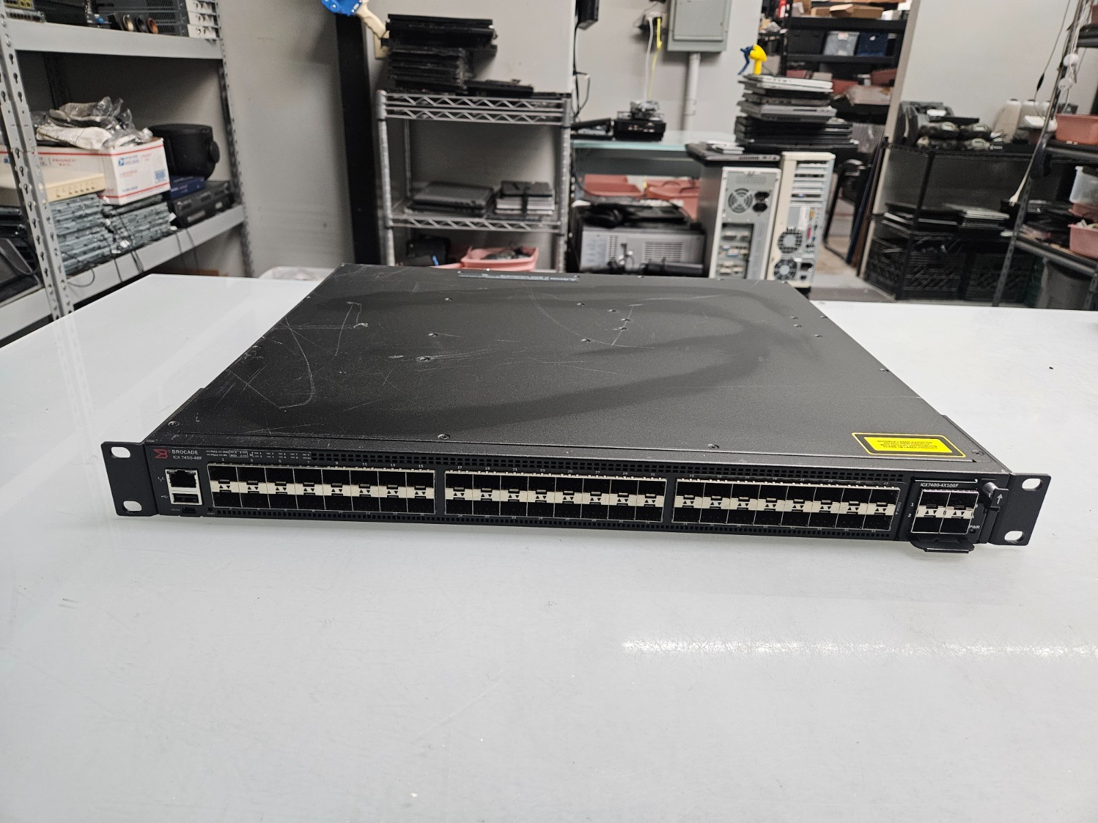 Brocade Ruckus ICX 7450-48F-E Switch With ICX7400-4X10GF & 2x ICX7400-1X40GQ