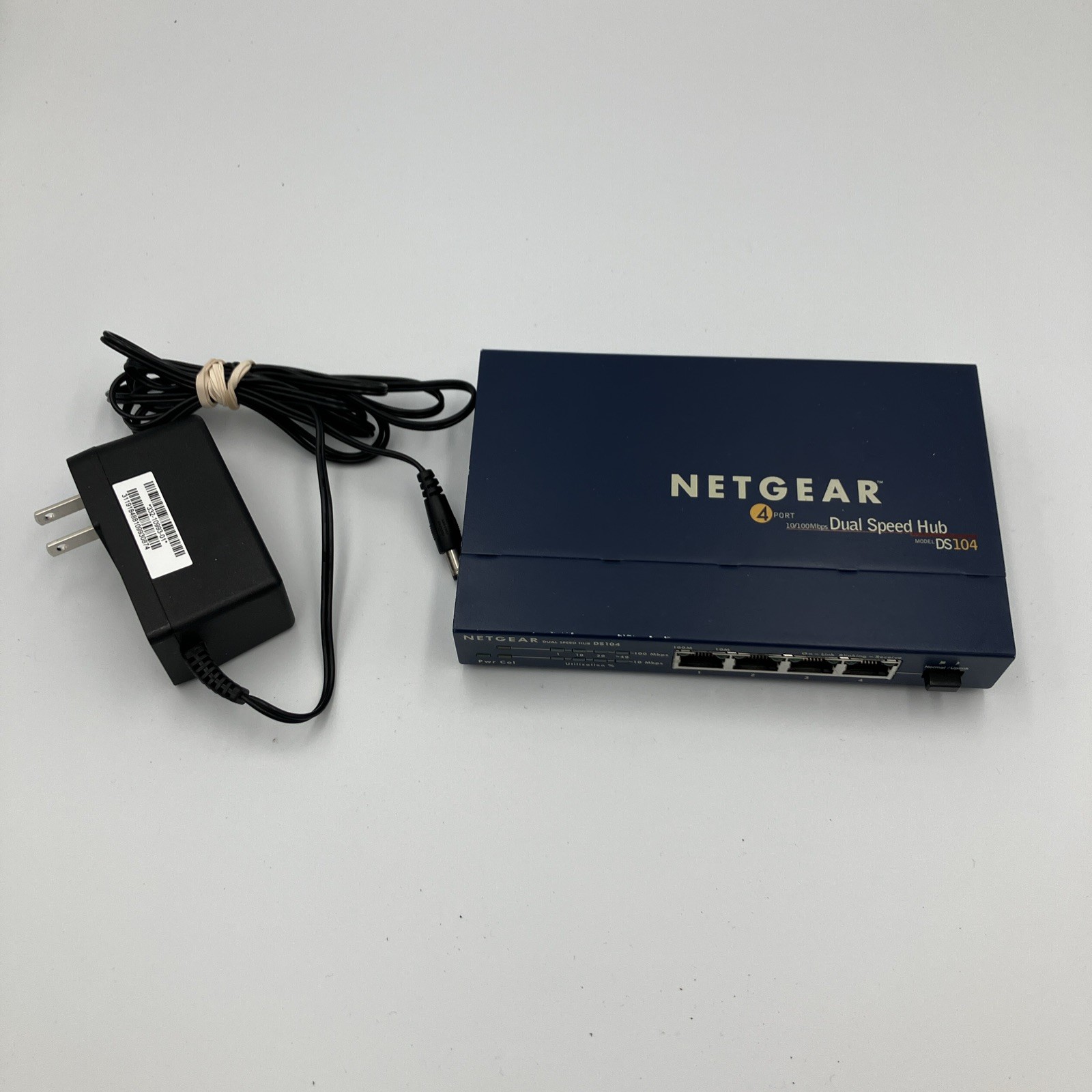 Netgear DS104 4-Port 10/100 Dual Speed Hub w/ Power Adapter