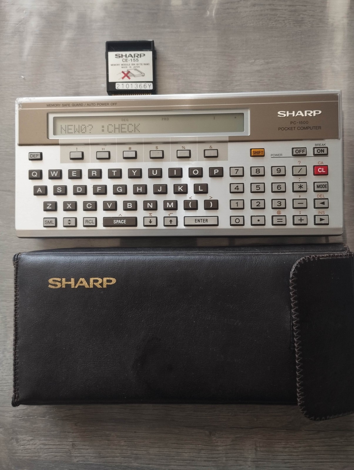 Sharp PC-1500 Pocket Computer with Case and RAM Module