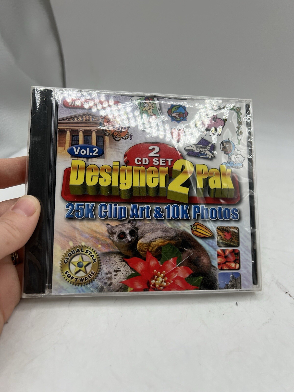 Windows 98 CD-ROM, Designer 2 Pak, 2 CD Set, 25K Clip Art & 10K Photos Vol.2