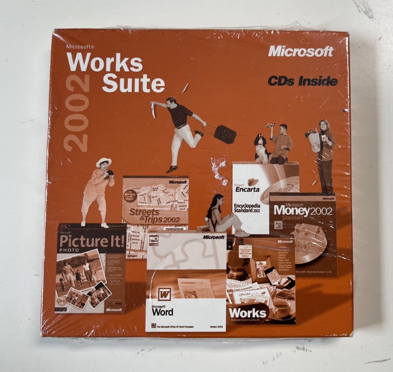 Microsoft Works Suite 2002 software CDs, new in plastic incl product key