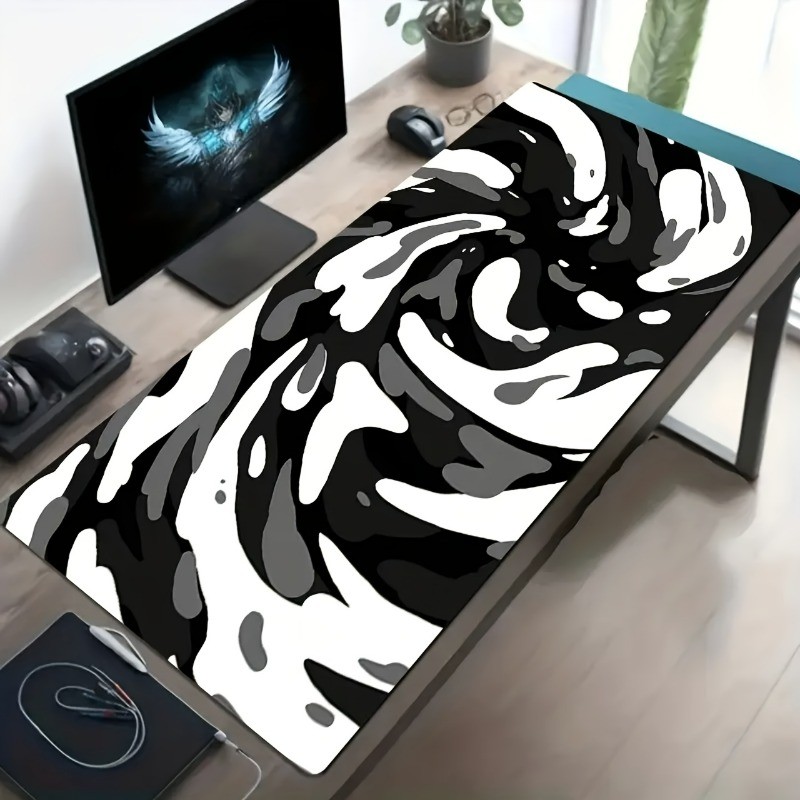 Bold Monochrome Desk Mat: Abstract Swirl Keyboard Pad for Workspaces & Study
