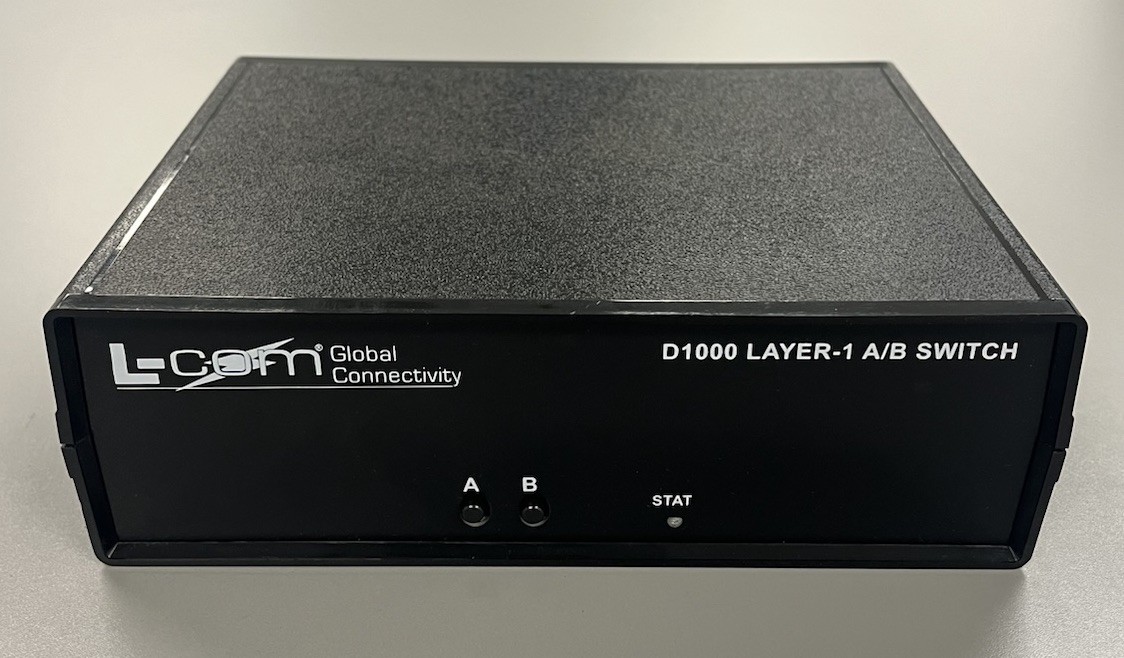 L-COM DB9 D1000 LAYER 1 A/B SWITCH BOX - LATCHING