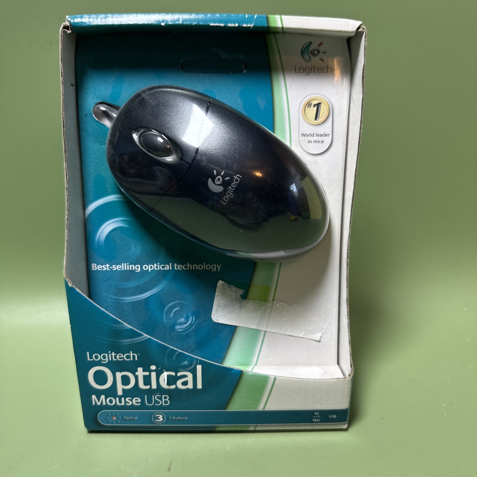 Logitech 931369-0403 3 Buttons, Scroll Wheel, USB Optical Mouse In Black Color