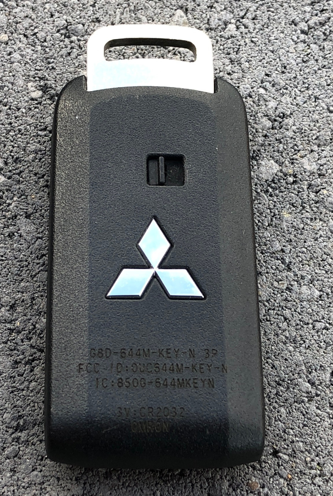 OEM Genuine Mitsubishi G8D-644M-KEY-N Keyless Remote Control Key Fob 8637C803