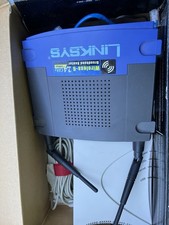 Bundle- 2 DSL Routers: Linksys WRT54G, Westell Model 2200, + cords + AC Adapters picture