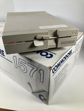 Commodore 1571 Disk Drive with manual disks cables original box packaging picture