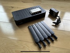 Cradlepoint E300-C18B Wireless Router w/ MC400-1200M-B Modem (No SIMs) picture