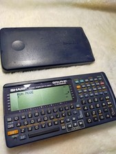 SHARP PC-G850V Pocket Computer Calculator BASIC C Language Programmable Vintage picture