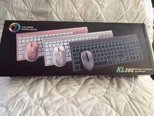 New in Box SABLUTE wireless keyboard/mouse combo w/ 7 colored backgrounds  picture