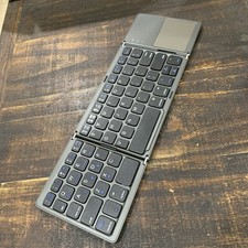 Ultra-thin Tri-fold Bluetooth Keyboard with touchpad Wireless Rechargeable picture