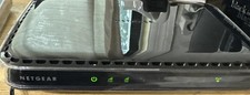 NETGEAR WN2500RP Universal Dual Band WiFi Range Extender, 4-port WiFi Adapter... picture