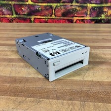 HP C1537-00240 SCSI SURESTORE DDS TAPE DRIVE 12/24GB DDS3 (TESTED WORKING) picture