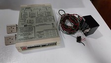 ADC Kentrox 77123-L2 T-SERV II CSU PLUG IN CARD w/enclosure, and power supply picture
