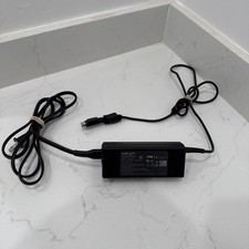 UpBright AC Adapter. 4-pin. Model D155-84W. Output is 12V-7A. Used but works picture